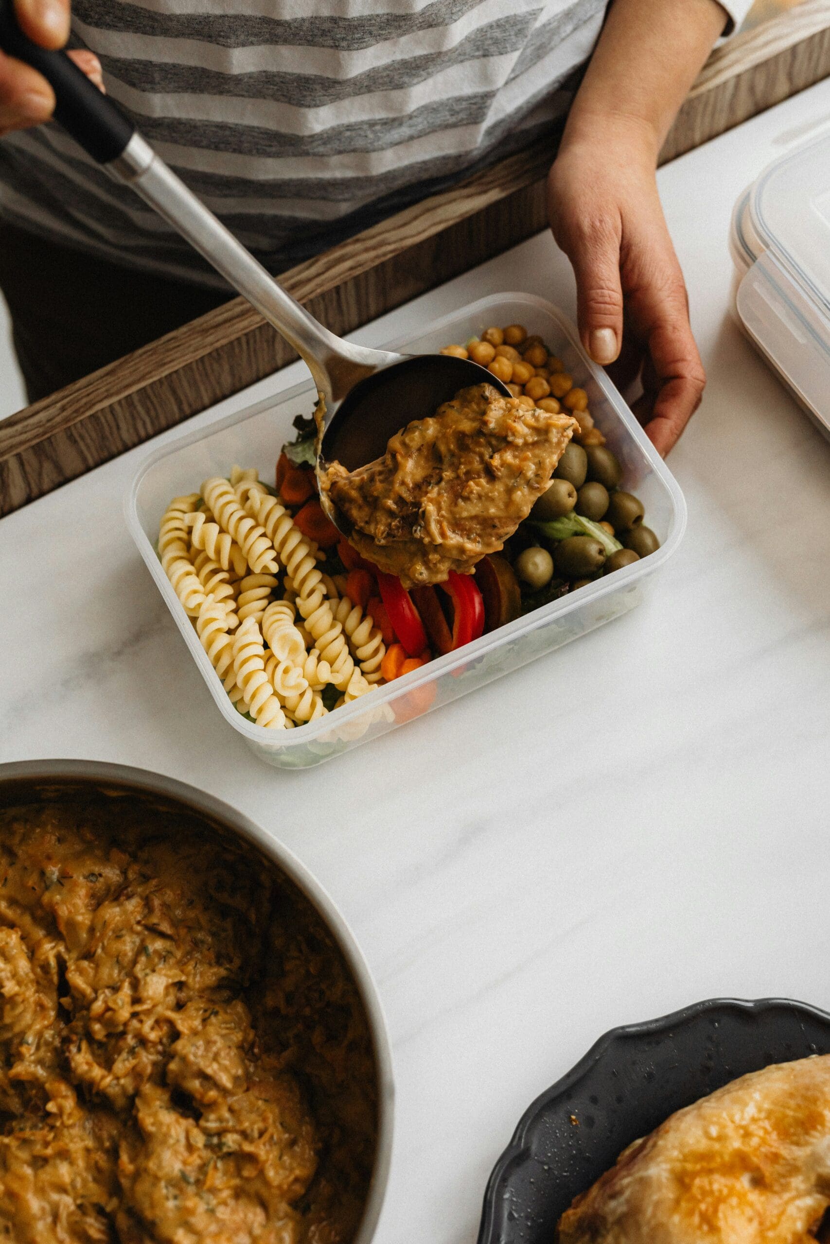 Preparing a balanced meal with controlled portions for weight loss