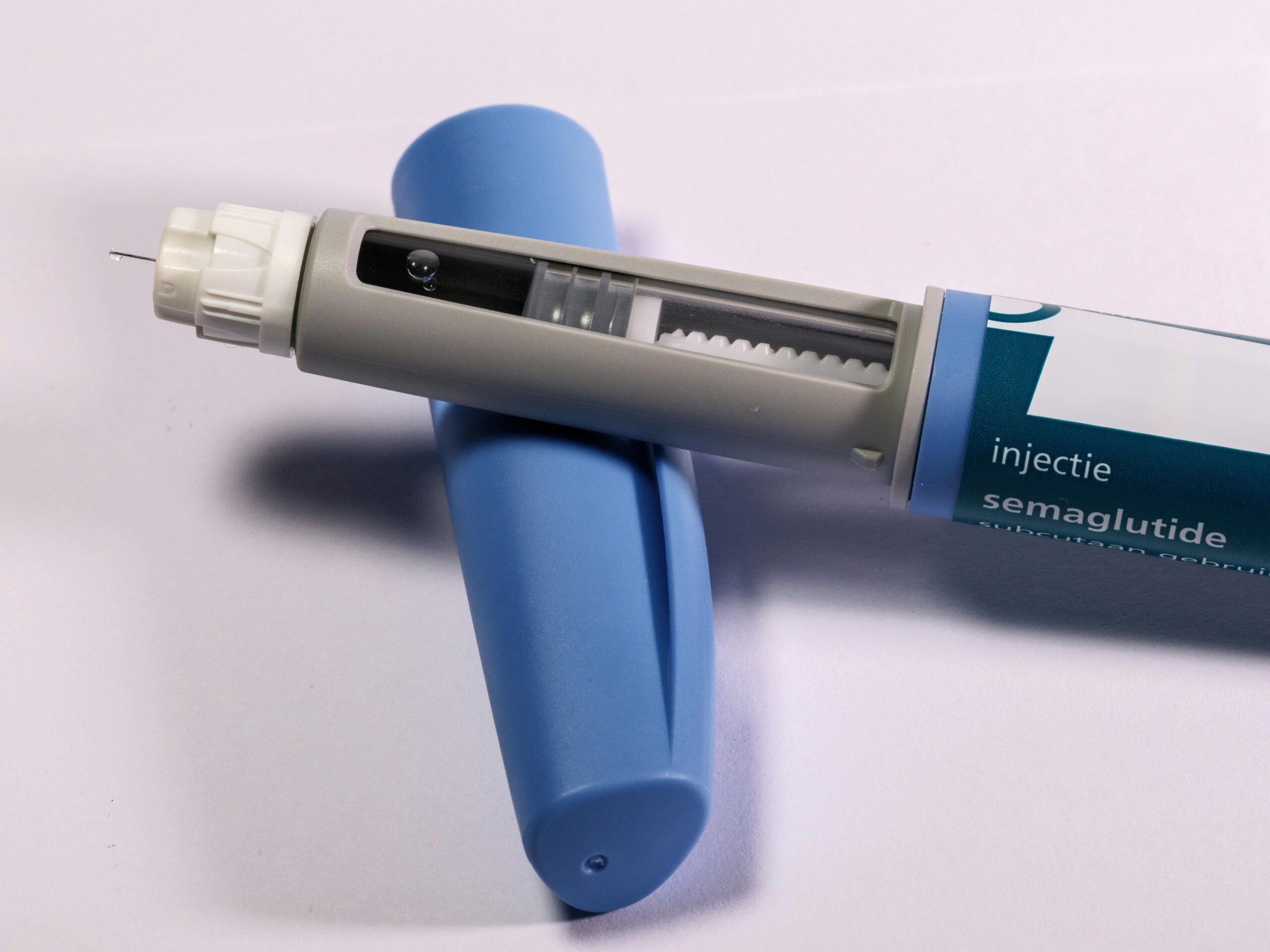 GLP-1 injection pen representing GLP-1 exercise and weight loss strategy
